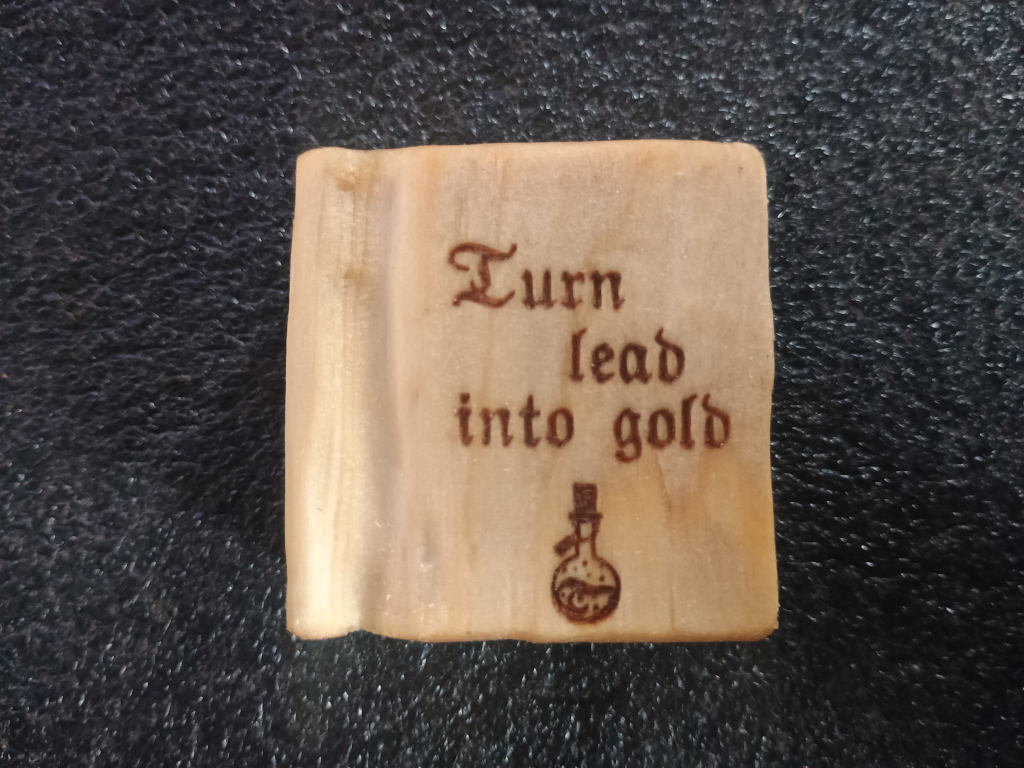 Book about turning lead into gold - front